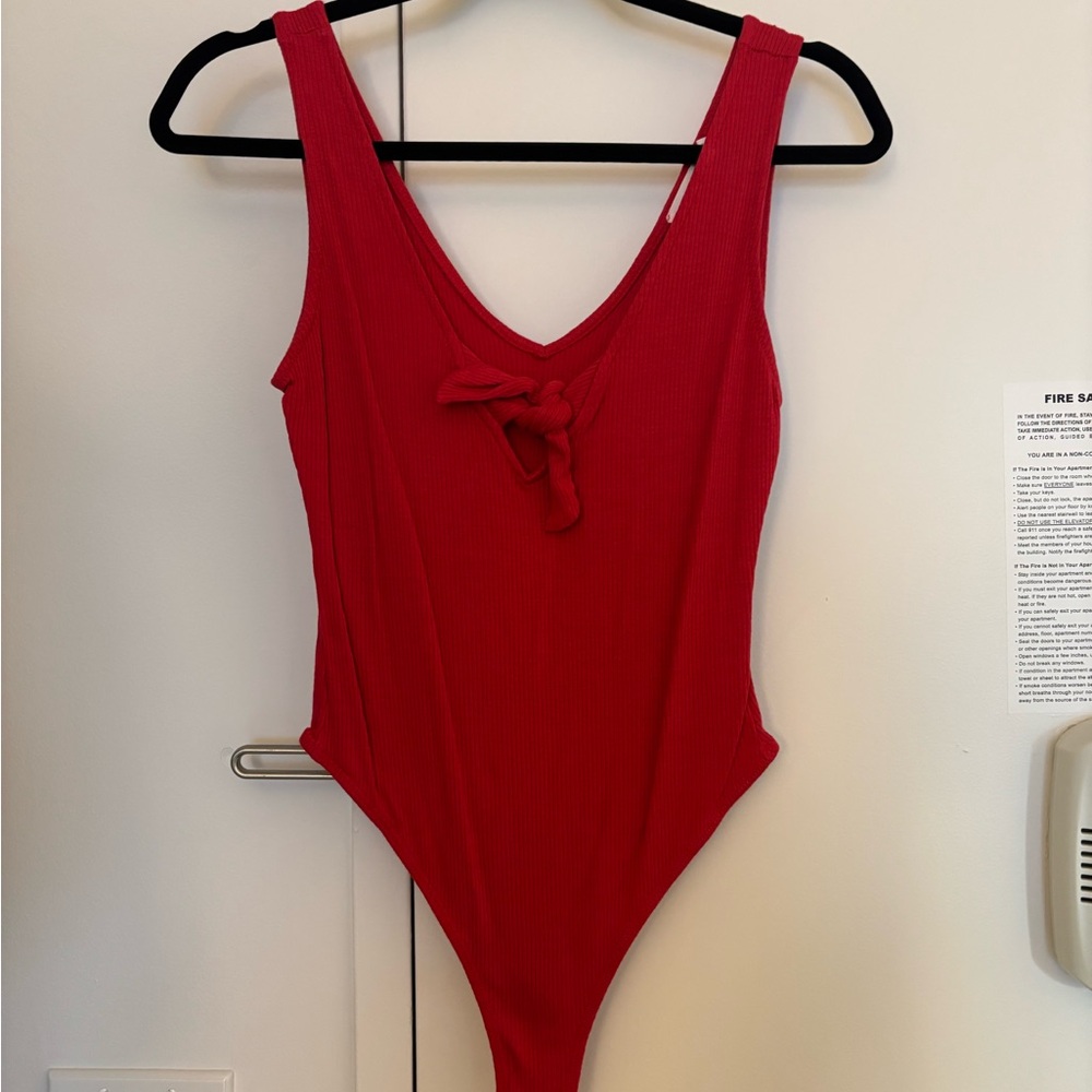 Red bow bodysuit